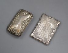 An Edwardian silver card case, Birmingham, 1908 and a late Victorian silver cigarette case.