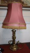 A Louis XV style ormolu candlestick, converted to a lamp