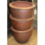 A set of three glazed pottery garden planters Diameter 40cm