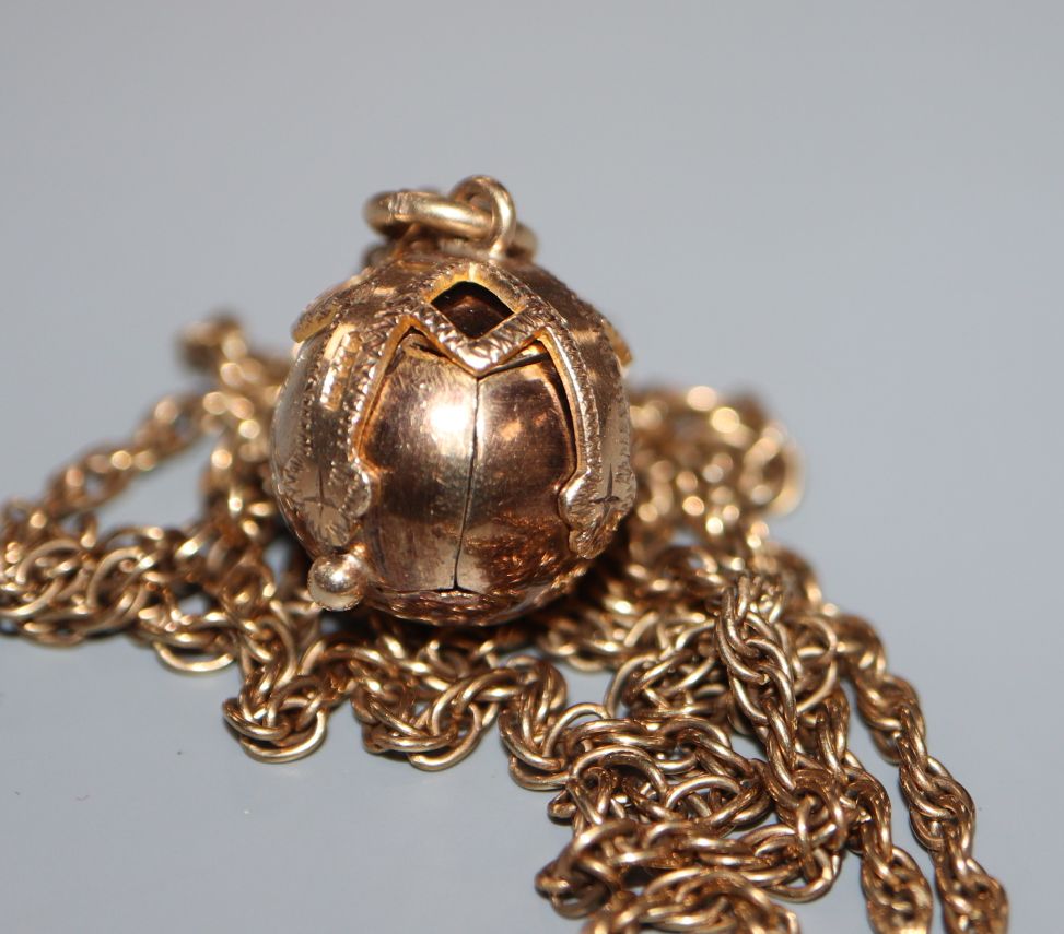 A Masonic silver gilt ball pendant on chain.