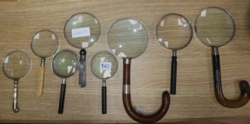 Eight umbrella / flatware handled magnifying glasses