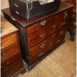 A George II walnut feather-banded chest fitted two short drawers and three graduated long drawers