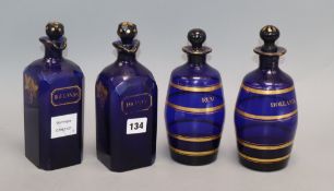 Four Regency or William IV gilt titled spirit decanters - Brandy, Two Hollands and Rum