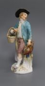 A Meissen figure of a fowler, 19th century, repaired