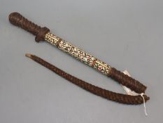 An Arab officer's sword / whip