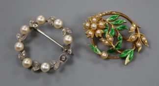 A yellow metal, enamel and pearl openwork wreath brooch and a pearl and diamond-set wreath brooch.