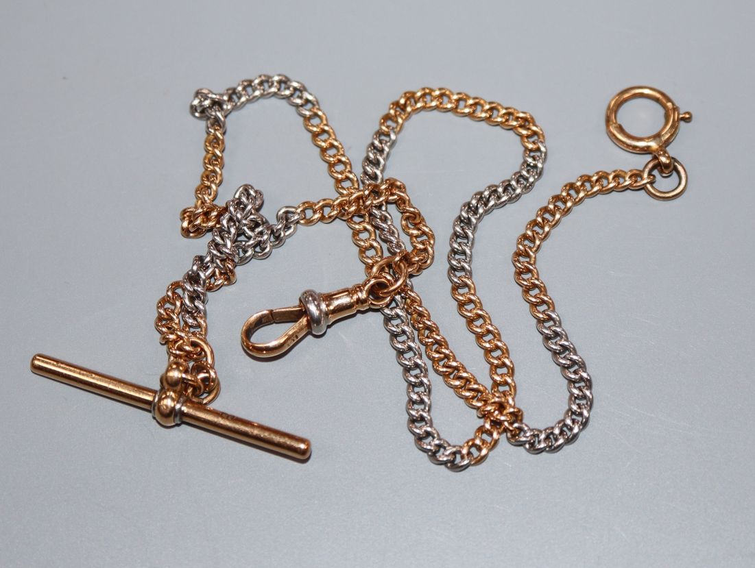 An 18ct yellow gold and platinum watch chain,