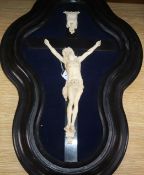 A late 19th century simulated ivory Corpus Christi length 66cm