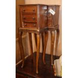 A pair of mahogany chests, each with three short drawers, on stands and squared angled cabriole legs