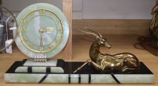 An Art Deco clock, with antelope surmount on green and black marble base length 55cm