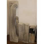 A carved stone fireplace surround