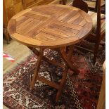 A teak folding garden table Diameter 70cm