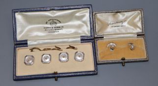 A set of four 18ct, pearl and mother of pearl dress studs in Mappin & Webb case and a pair of