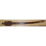 A Polynesian or Aboriginal carved wooden staff or spear thrower length 87cm