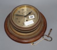 A brass bulkhead timepiece