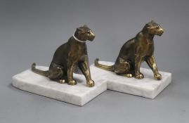 A pair of lioness bookends, signed Tedd height 12cm