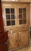 A 19th century French glazed and panelled oak standing corner cupboard W.128cm