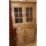 A 19th century French glazed and panelled oak standing corner cupboard W.128cm