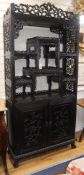 A 19th century Chinese carved hardwood china display cabinet W.100cm
