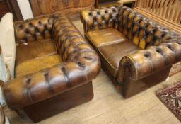 A pair of chesterfield sofas W.160cm