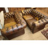 A pair of chesterfield sofas W.160cm