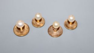 Four 15ct and cultured pearl set dress studs.