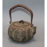 A Japanese Meiji period cast iron Tetsubin (tea kettle), signed