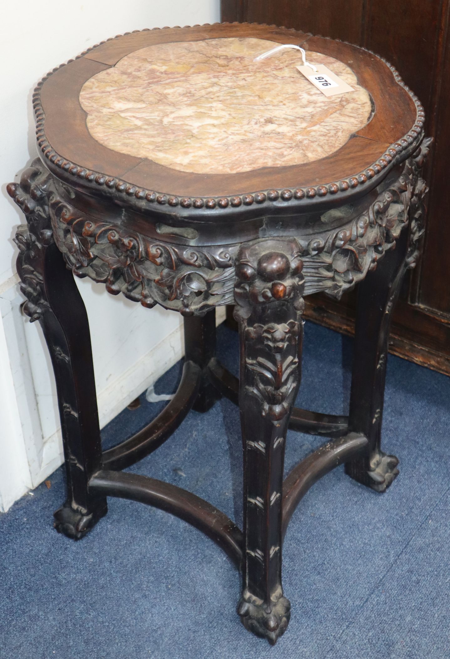 A pair of Chinese marble top jardiniere stands H.62cm