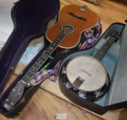 A cased ukulele and a cased Melodyuke