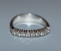 A Georg Jensen & Wendel 750 white metal and nine stone diamond half hoop ring, size M.
