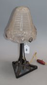 A French Art Deco wrought iron and frosted glass table lamp height 38cm