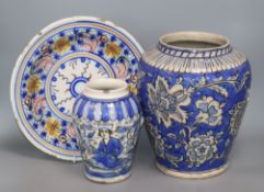 Two Persian pottery vases and a dish