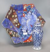 A Japanese dish by Fukugawa and a Chinese blue and white vase and cover