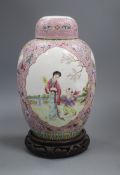 A Chinese famille rose lidded jar and stand height 26cm excluding stand