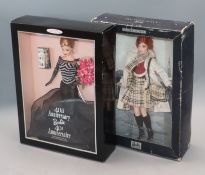 Three Fashion Barbie dolls