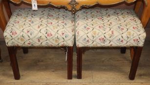 A pair of Georgian style mahogany stools