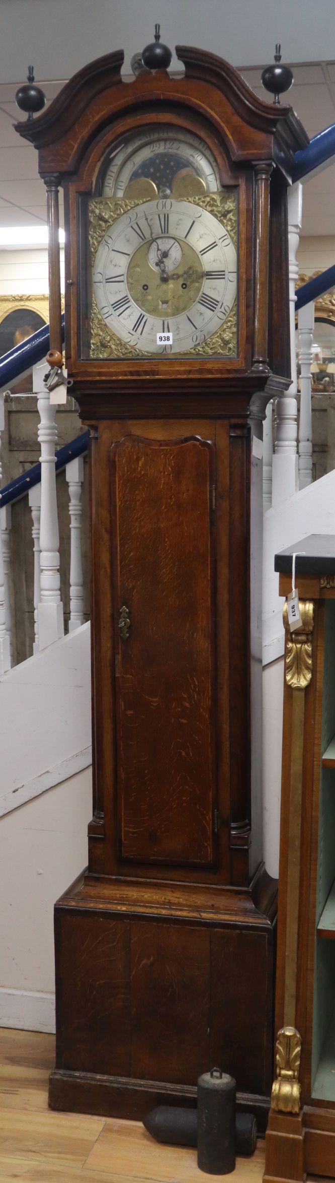 An 18th century oak 8 day longcase clock, with moonphase dial by John Smith, Chester H.approx.