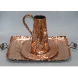 A Newlyn style copper jug, dish and tray