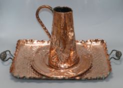 A Newlyn style copper jug, dish and tray