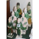 Four pairs of Chinese pottery figures