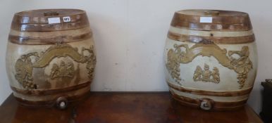 A pair of stoneware barrels H.42cm