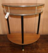 A 1970's demi-lune side table W.63cm