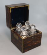 A Victorian coromandel four bottle decanter box