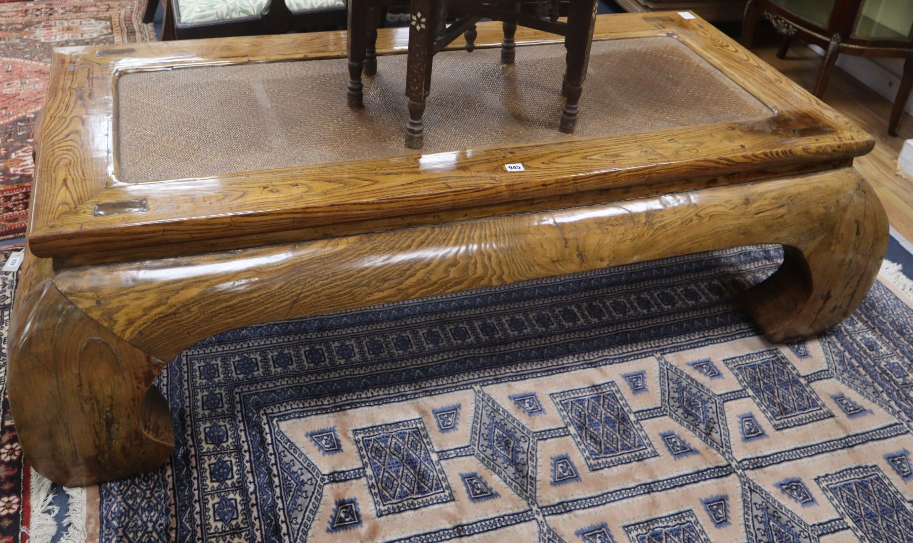 A Chinese caned elm coffee table L.164cm