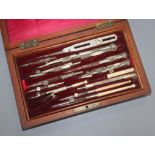 A rosewood cased drawing set