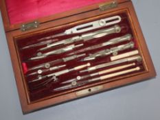 A rosewood cased drawing set