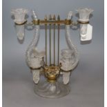 A Bohemian brass and glass lyre-shaped centrepiece