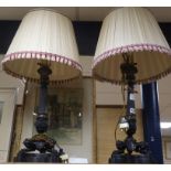 A pair of Regency style bronze table lamps