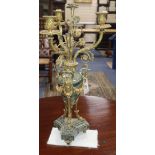 A French marble and gilt metal three branch candelabra