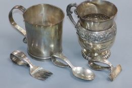 Two Tiffany & Co sterling mugs including a reproduction original by John Dixwell, Boston and a